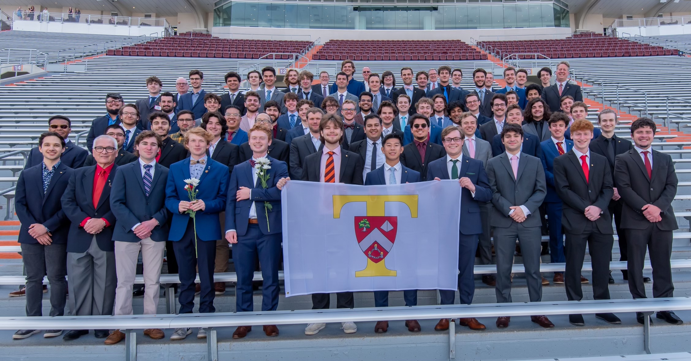 Members of Triangle fraternity on steps